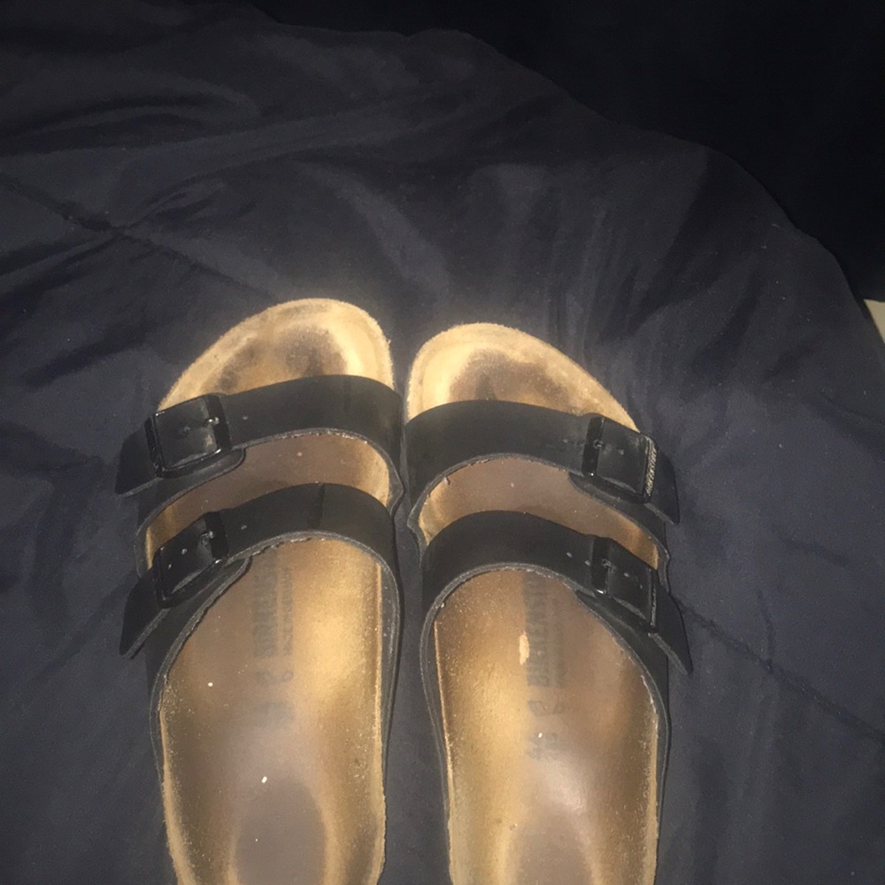 Black strap brown Birkenstock’s
